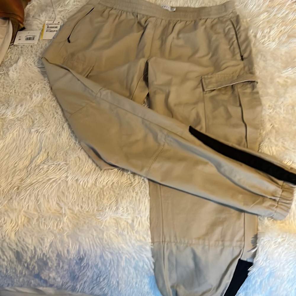 Beige-leisure track wear.  Brand new, never worn from Nordstrom, light weight.